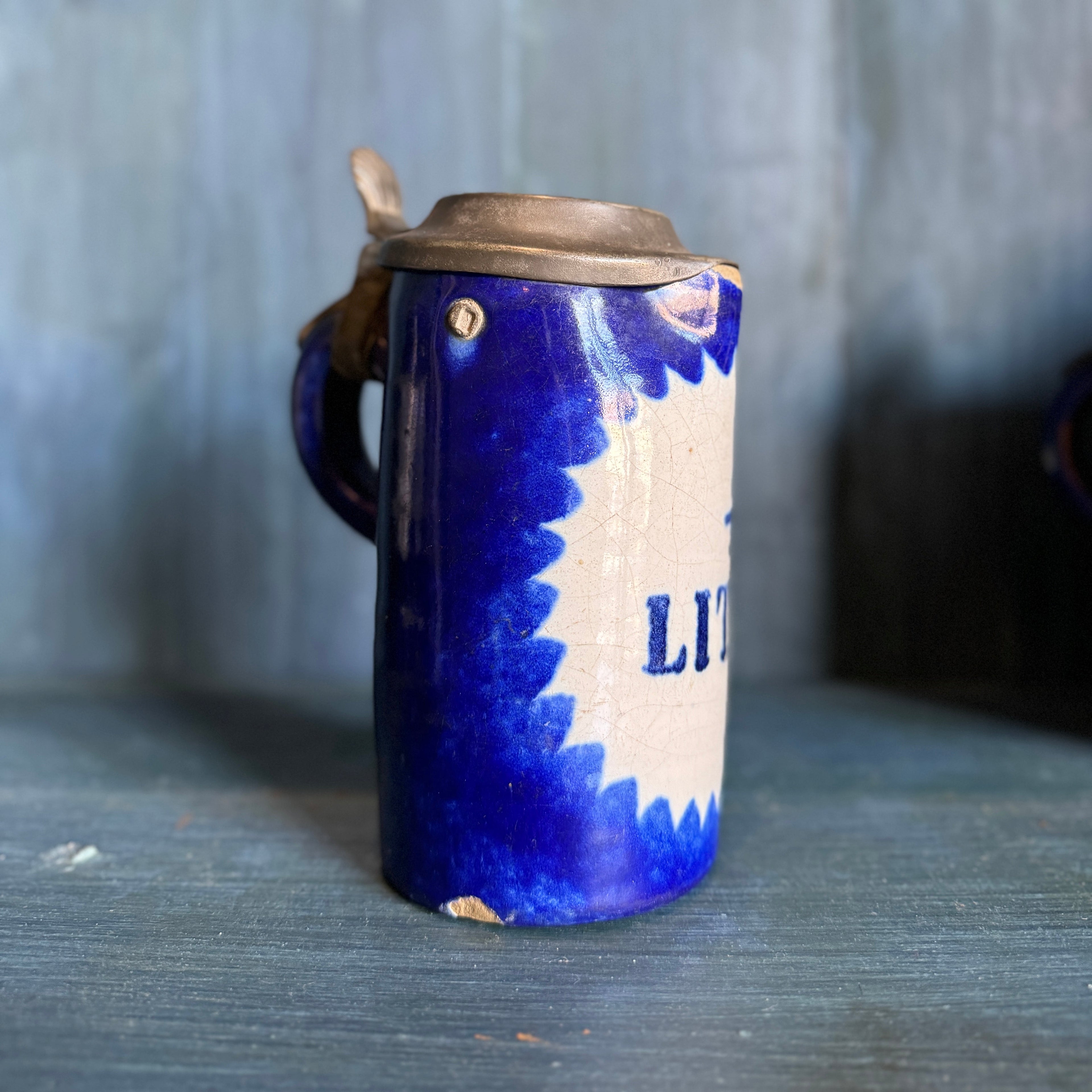 Pot d'un litre en porcelaine belge vintage