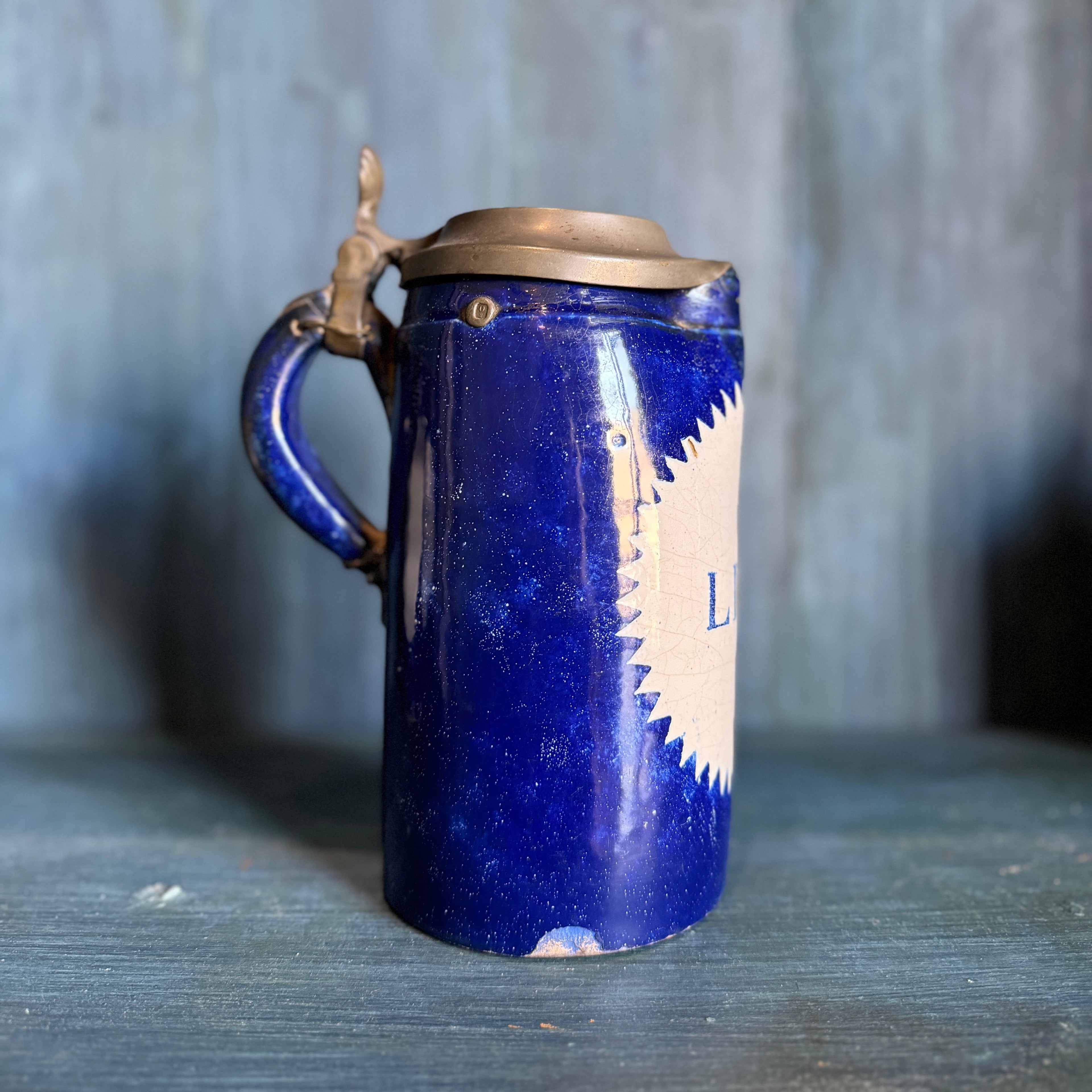 Pot d'un litre en porcelaine belge vintage