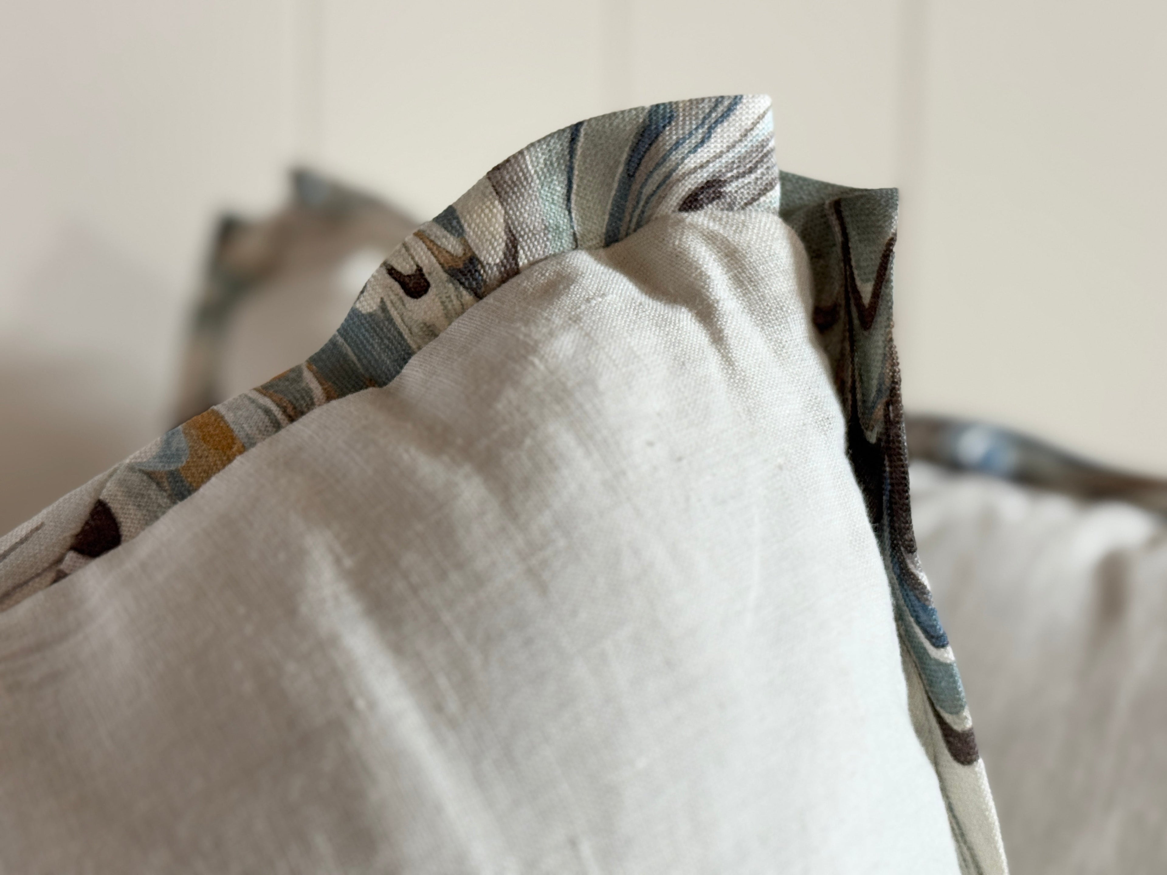 Housse de coussin en lin avec bordure marbrée